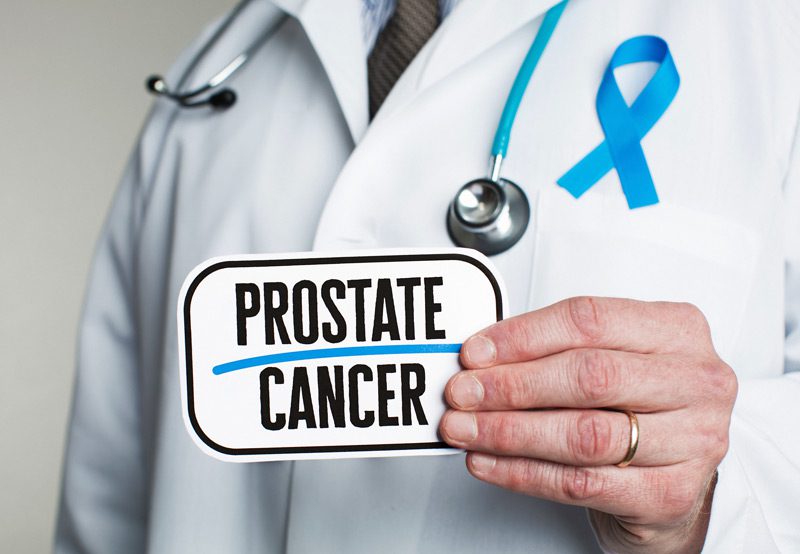 Doctor-holding-a-sign-about-prostate-cancer-awareness